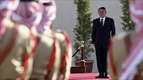 King Abdullah of Jordan reviews honour guard