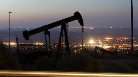 A file photo of an oil derrick in rural California