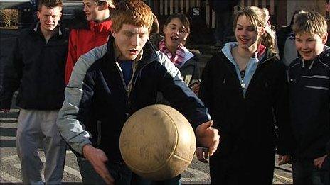 Man with a ball during the Atherstone Ball Game