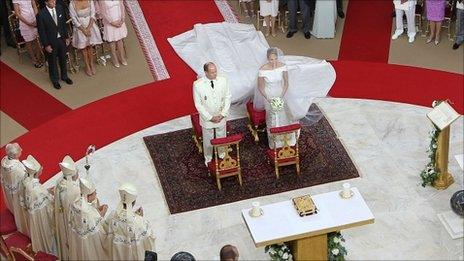 Prince Albert II and Princess Charlene stand at the altar during their religious wedding in Monaco. Photo: 2 July 2011