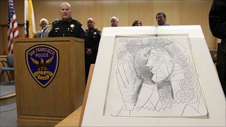 San Francisco police chief Greg Suhr speaks next to the recovered Picasso drawing.