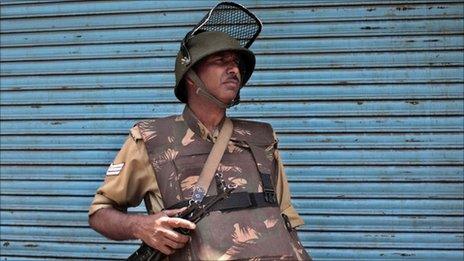 An Indian paramilitary soldier in Srinagar on 11 June 2011