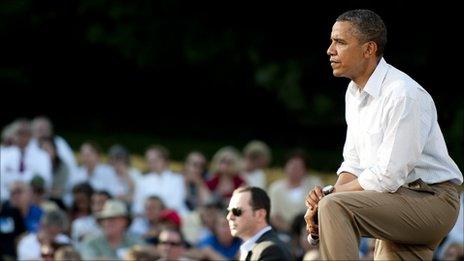 US President Barack Obama listens to questions as he speaks at a town hall style meeting in Decorah, Iowa, on 15 August 2011