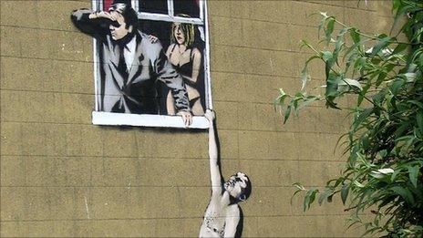 Banksy work on a building in Park Street in Bristol