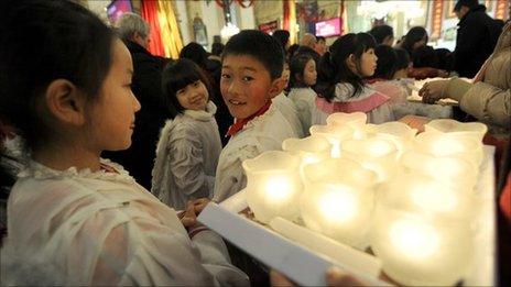 Children attend Mass in Beijing