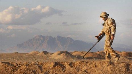 British soldier on a training exercise to detect IEDs in Camp Bastion in the Helmand province of Afghanistan