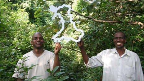 Elias Kimaru (WWF project Executive) and Sururu Lagiza from the Kaya Muhaka group within the Kaya sacred forest,