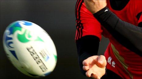 Rugby player catching a ball