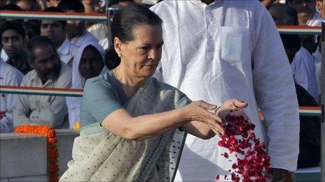Sonia Gandhi paying a floral tribute to Mahatma Gandhi on 2 October 2011.