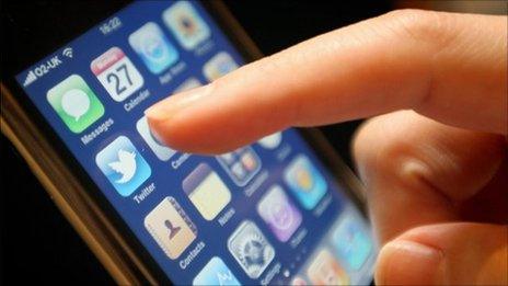 An iPhone's touchscreen being used