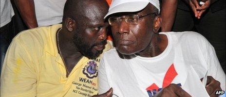 George Weah (l) and Winston Tubman on 7 October