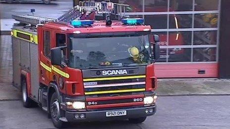 Fire engine leaving a station in west Wales
