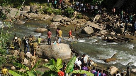 Villager mourns the death of her father after the bridge collapse in Bijonbari, Darjeeling, West Bengal, on 23 October 2011