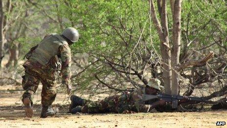 Kenyan soldiers advance near Liboi in Somalia, on 18 October 2011
