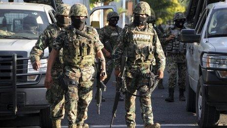 Mexican marines patrol the streets of Veracruz on 6 October 2011
