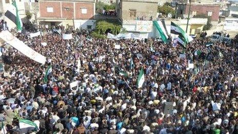 Opposition supporters rally in the Syrian town of Hula, 13 November