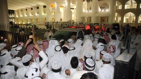 Kuwaitis demonstrators storm the Kuwaiti National Assembly in Kuwait City