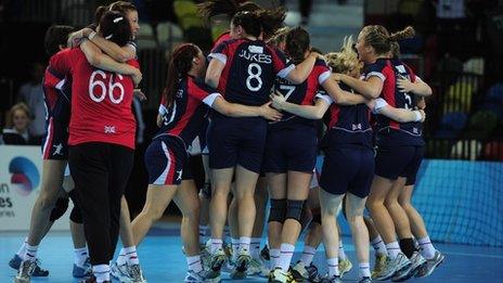 GB's women's handball team celebrate victory over African champions Angola