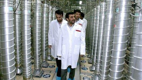 A picture released by Iran's presidency office in April 2008 shows Iranian President Mahmoud Ahmadinejad visiting the Natanz uranium enrichment facility south of Tehran
