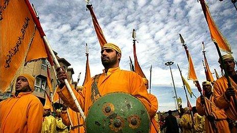 Men in Karbala dressed as troops from the Battle of Karbala