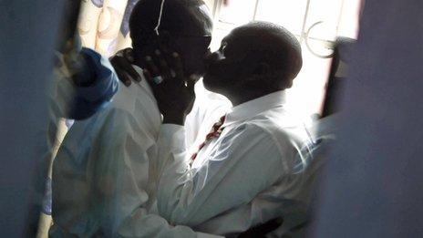 Gay men kiss in Nairobi (20 June 2006)