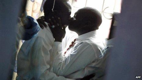 Gay men kiss in Nairobi (20 June 2006)