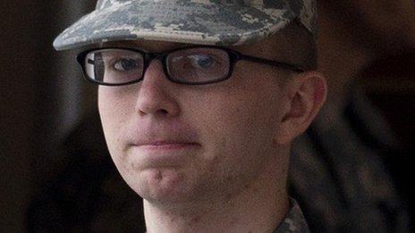 Bradley Manning is escorted from court at Fort Meade, Maryland, on 21 December 2011