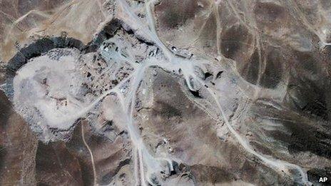 Satellite image provided by GeoEye in September 2009 showing facility under construction inside a mountain some 20 miles (32km) north-east of Qom, Iran