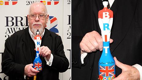 Sir Peter Blake holds his design for the 2012 Brit Award
