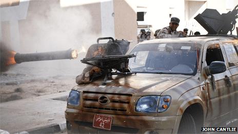 Car-mounted anti-tank missile being fired