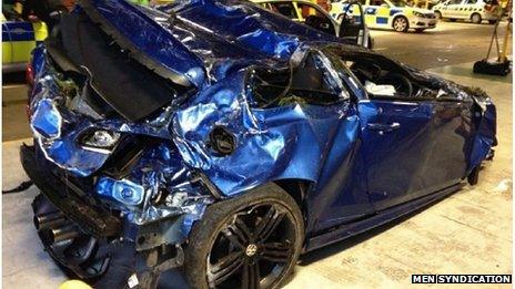 Damaged Greater Manchester Police car