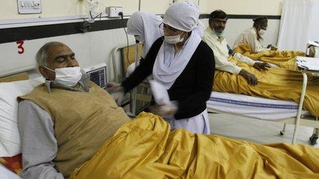 Hospital staff attend cardiac patients in a local hospital in Lahore, Pakistan on Wednesday, Jan 25, 2012.
