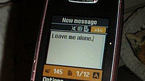 Girl writes "Leave me alone" in a text message (generic)