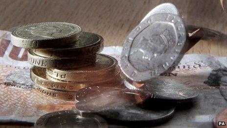 Assorted pound notes and coins