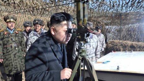Undated image from KCNA news agency shows Kim Jong-un inspecting a military unit