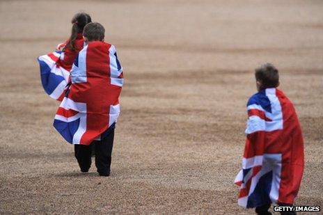 Children wrapped in union jack flag