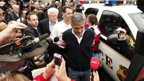 Actor George Clooney is arrested for civil disobedience after protesting at the Sudan Embassy in Washington on 16 March 2012