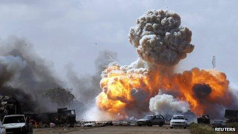A NATO air strike on forces loyal to Colonel Gaddafi, 20 March 2011
