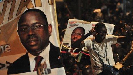 A poster of Macky Sall and his supporters celebrating