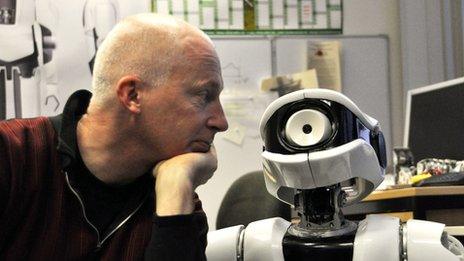 Prof Marcus du Sautoy and a robot