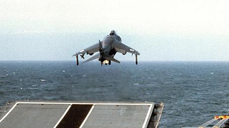 Harrier jet taking off from HMS Hermes