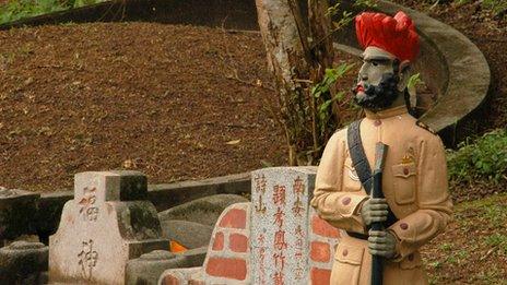 A Sikh guard is one of the features of one of the biggest tombs in Bukit Brown cemetery in Singapore 30 March, 2012