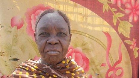 Fatna Khamis Bilal outside her house