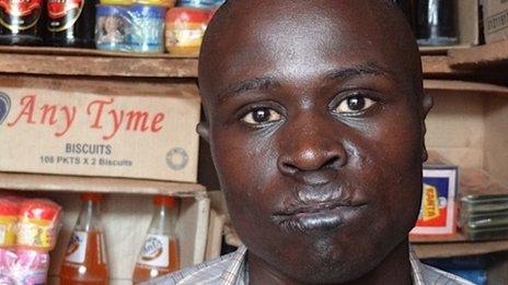 Geoffrey Obita, who was attacked by the LRA in 2003, in his shop outside Kitgum town in 2012