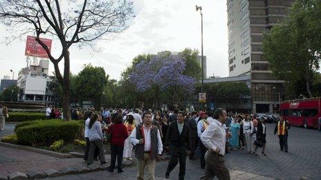 People gather in a park after an earthquake in Mexico City, 11 April, 2012.