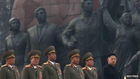 Kim Jong-un (far right) attends the unveiling of statues of Kim il-Sung and Kim Jong-il in Pyongyang, 13 April