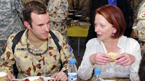 File photo (October 2010) of Australian PM Julia Gillard with an Australian soldier in Afghanistan