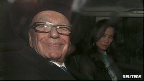 Rupert Murdoch being driven away after giving evidence to the Leveson inquiry