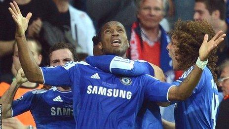 Didier Drogba (centre) celebrates with team-mates