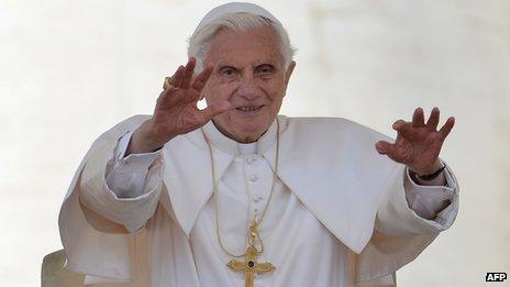 Pope Benedict XVI blesses people at a General Audience